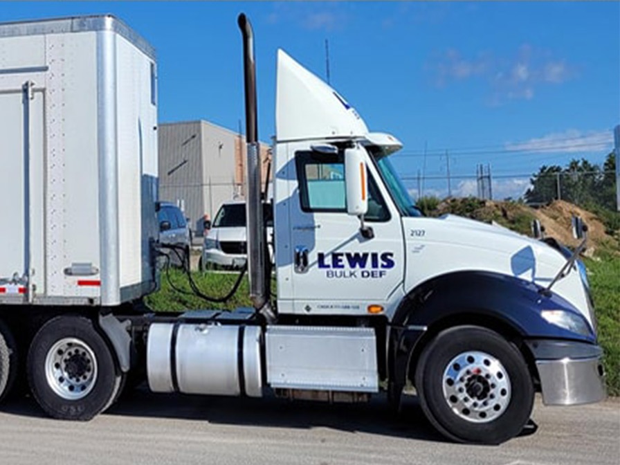 Lewis Bulk DEF delivery truck with box trailer for packaged DEF jugs and drums in Ontario